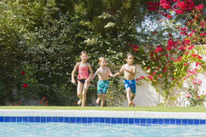 Schedule changes can be hard for energetic kids like these running to the pool.
