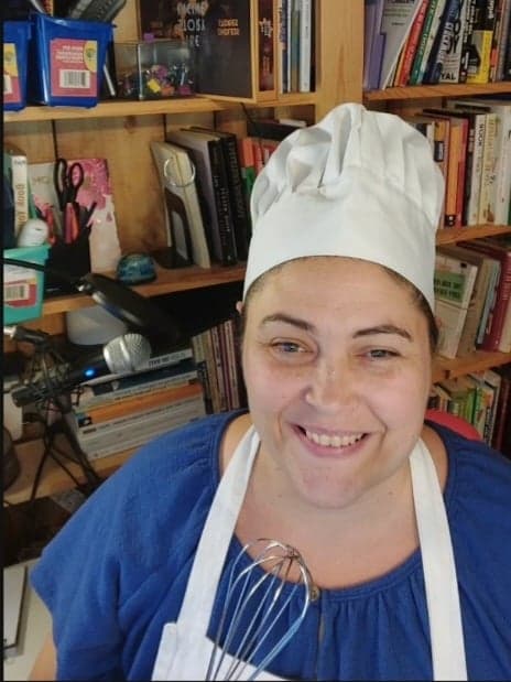 Jennifer Harshman, The Book Baker is pictured here, ready to share a baker's dozen reasons to write a book and 6 not to.